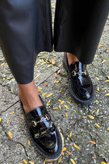 black leather loafers
