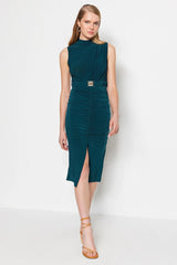 belted emerald green dress