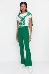 green flare pants