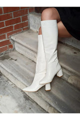 white heeled boots