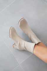 ecru heeled boots