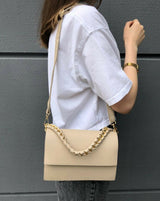 Cream women handbag