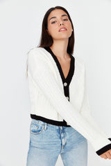 white buttoned cardigan