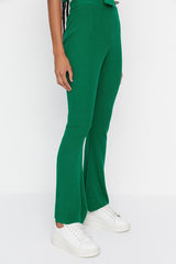 green flare pants