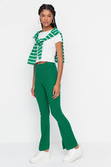 green flare pants