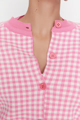 pink buttoned cardigan
