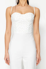 white pearl jumpsuit