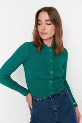 green buttoned knit cardigan