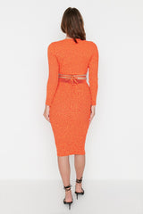 orange top and skirt set