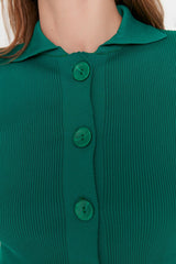 green buttoned knit cardigan