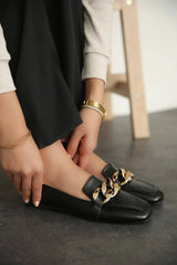 Black leather flats