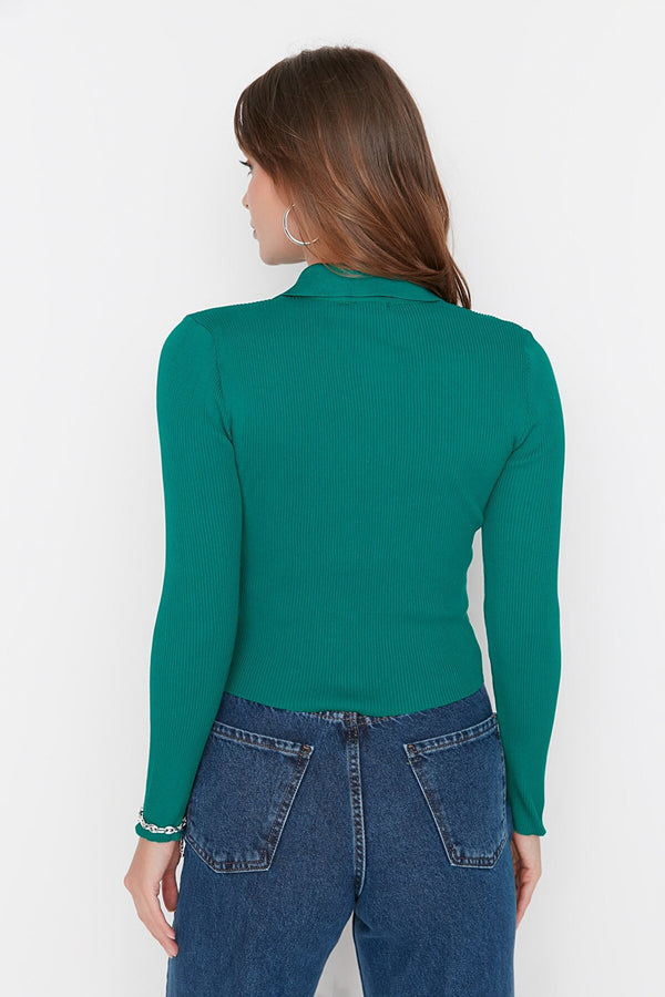 green buttoned knit cardigan