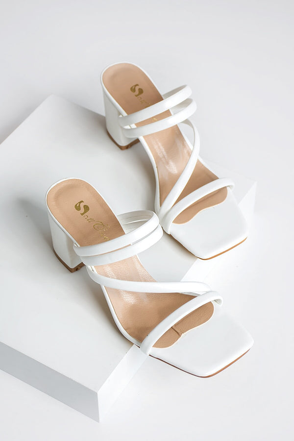 white heeled sandals