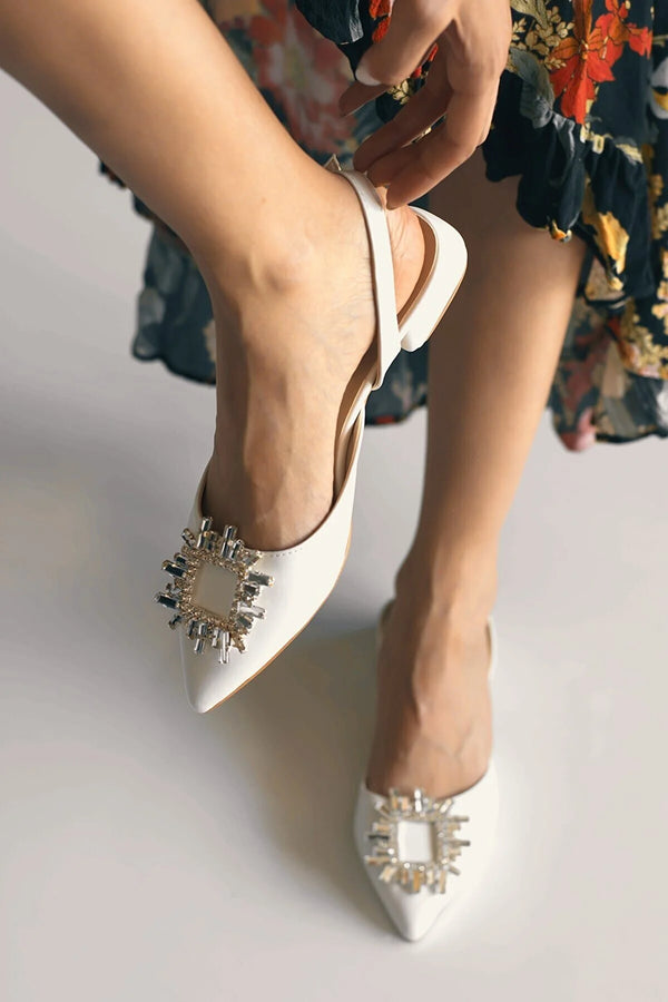 White embellished flats